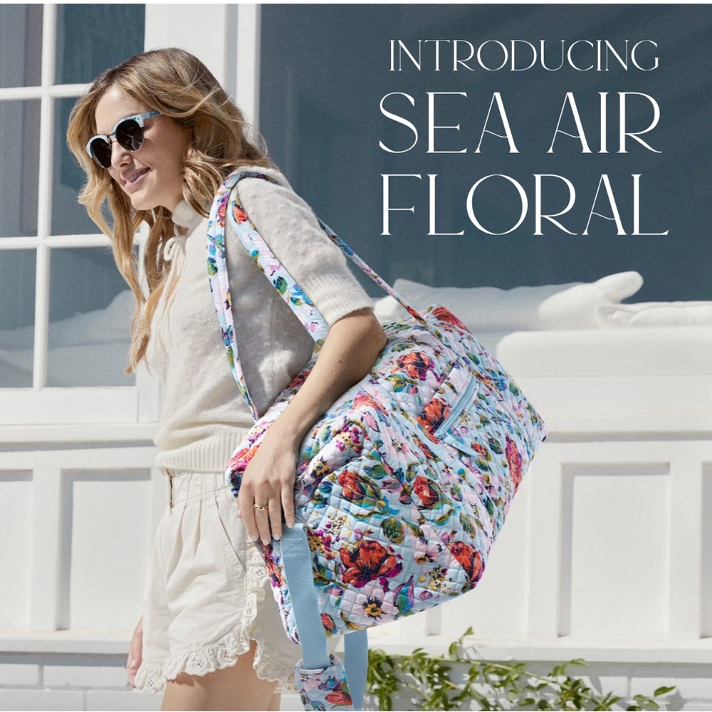 NWT large travel duffel sea air floral. Won in a contest. Never used.